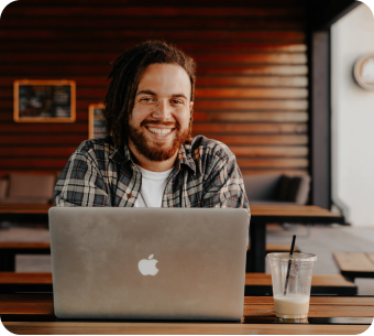 men with a laptop in a table