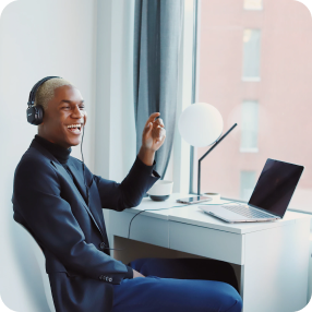 men smilling in a telemarketing call